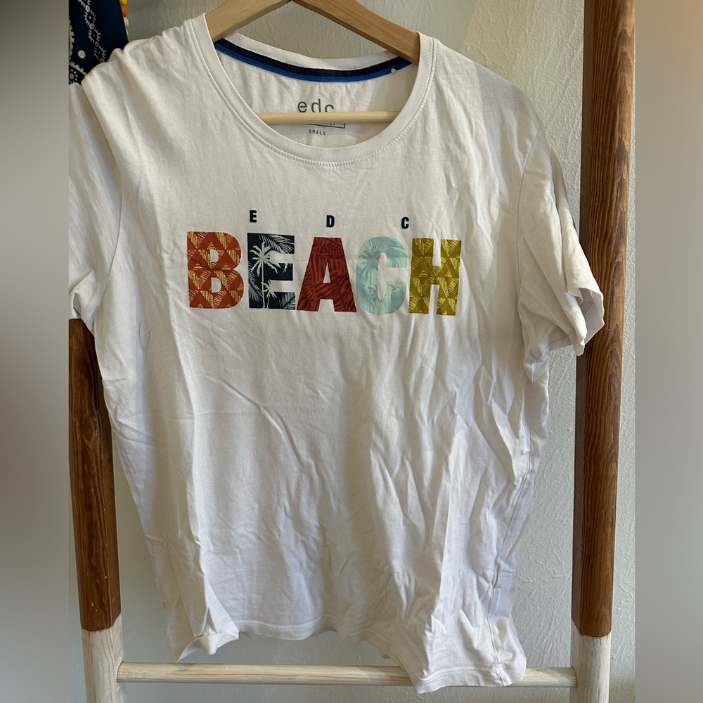 Beach graphic tee. Coming from Europe